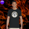 a man wearing a black t-shirt with a panic print made by the asocial chameleon