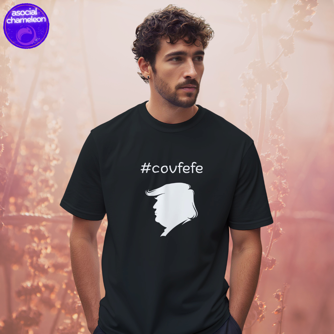 a man in a black t-shirt with the print covfefe on the front made by the asocial chameleon